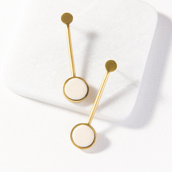 ivory and brass ceramic pendulum drop earrings 