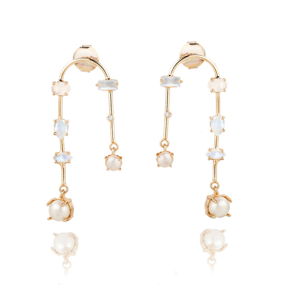 A golden arch earring is adorned with pearl, moonstone and Zirconia