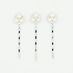 trio of pearl and crystal bridal hairpins