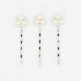 trio of pearl and crystal bridal hairpins