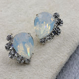 opal teardrop bridal earrings with crystals in silver setting 