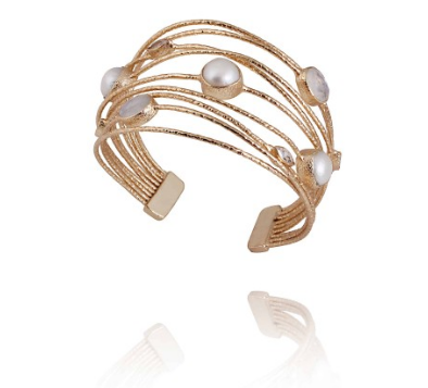 18kt gold plated demi-cuff with a collection of elegant Moonstone, fresh water pearl, and Zirconia.